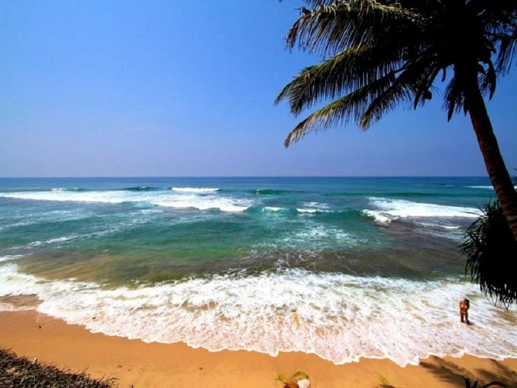 Time N Tide Beach Resort Hikkaduwa Exterior photo